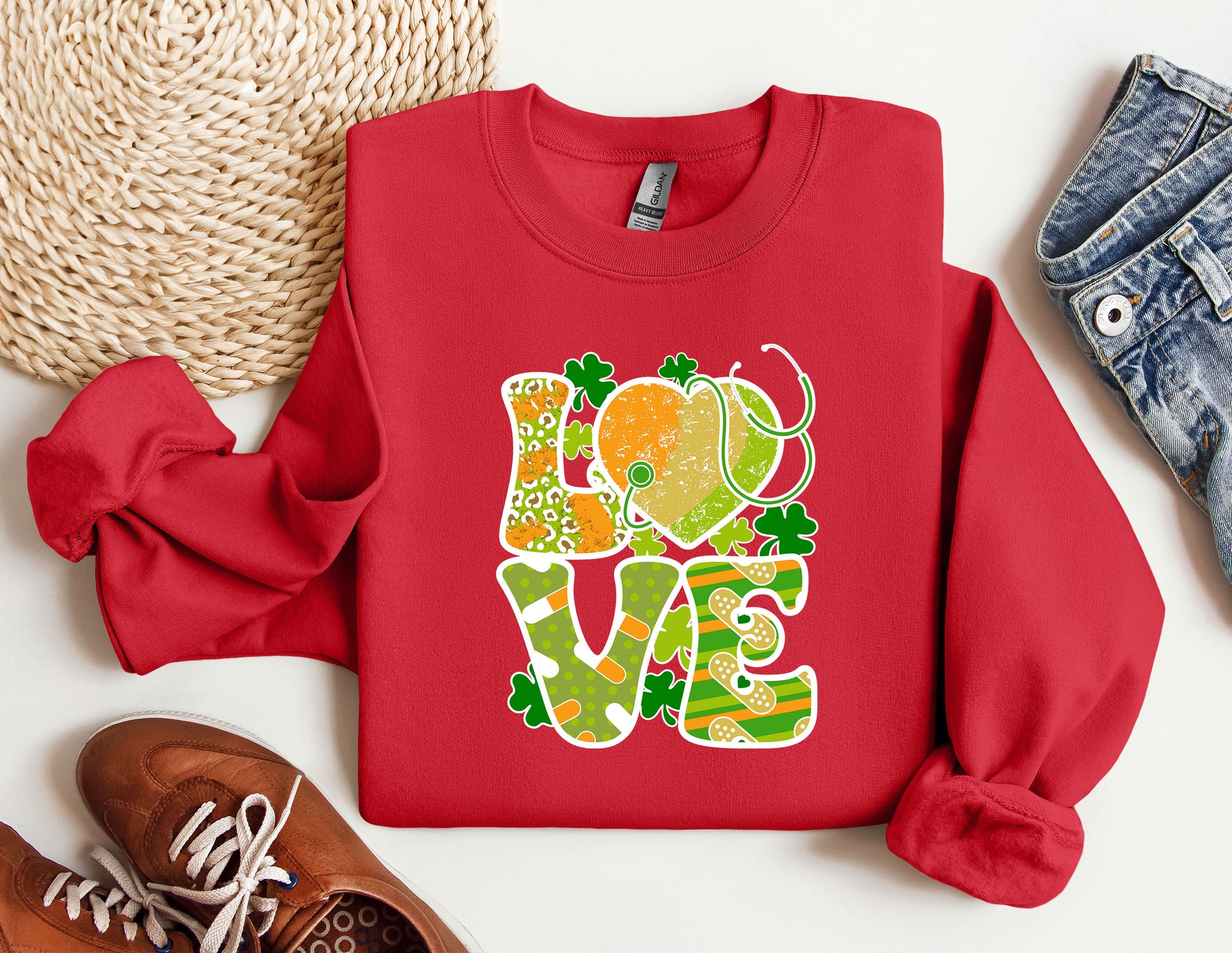 a red sweatshirt with the word love on it