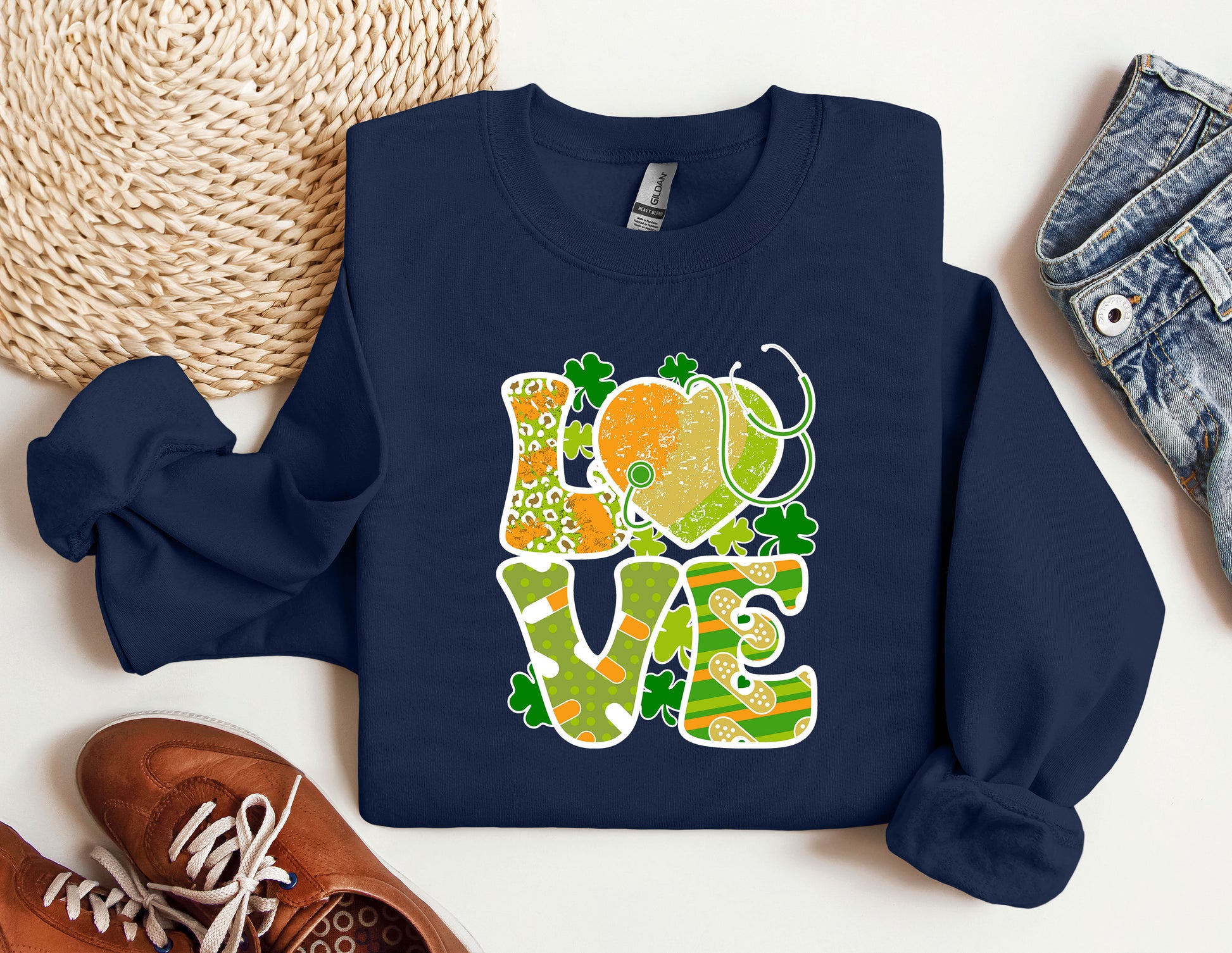 a t - shirt that says love with an elephant on it