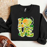 a black sweatshirt with the words love and shamrocks on it