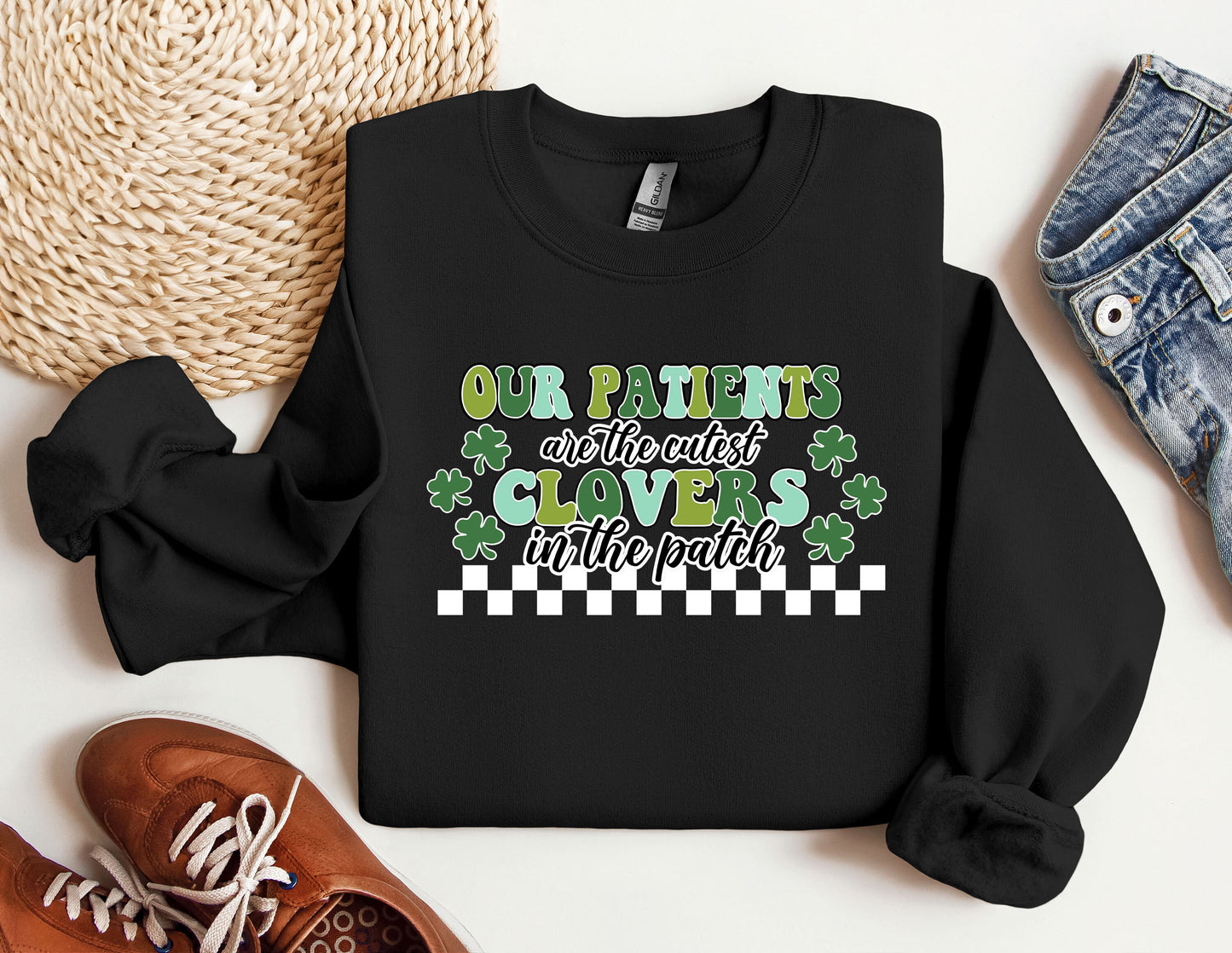 a st patrick&#39;s day sweater with a pair of sneakers