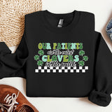 a st patrick's day sweater with a pair of sneakers