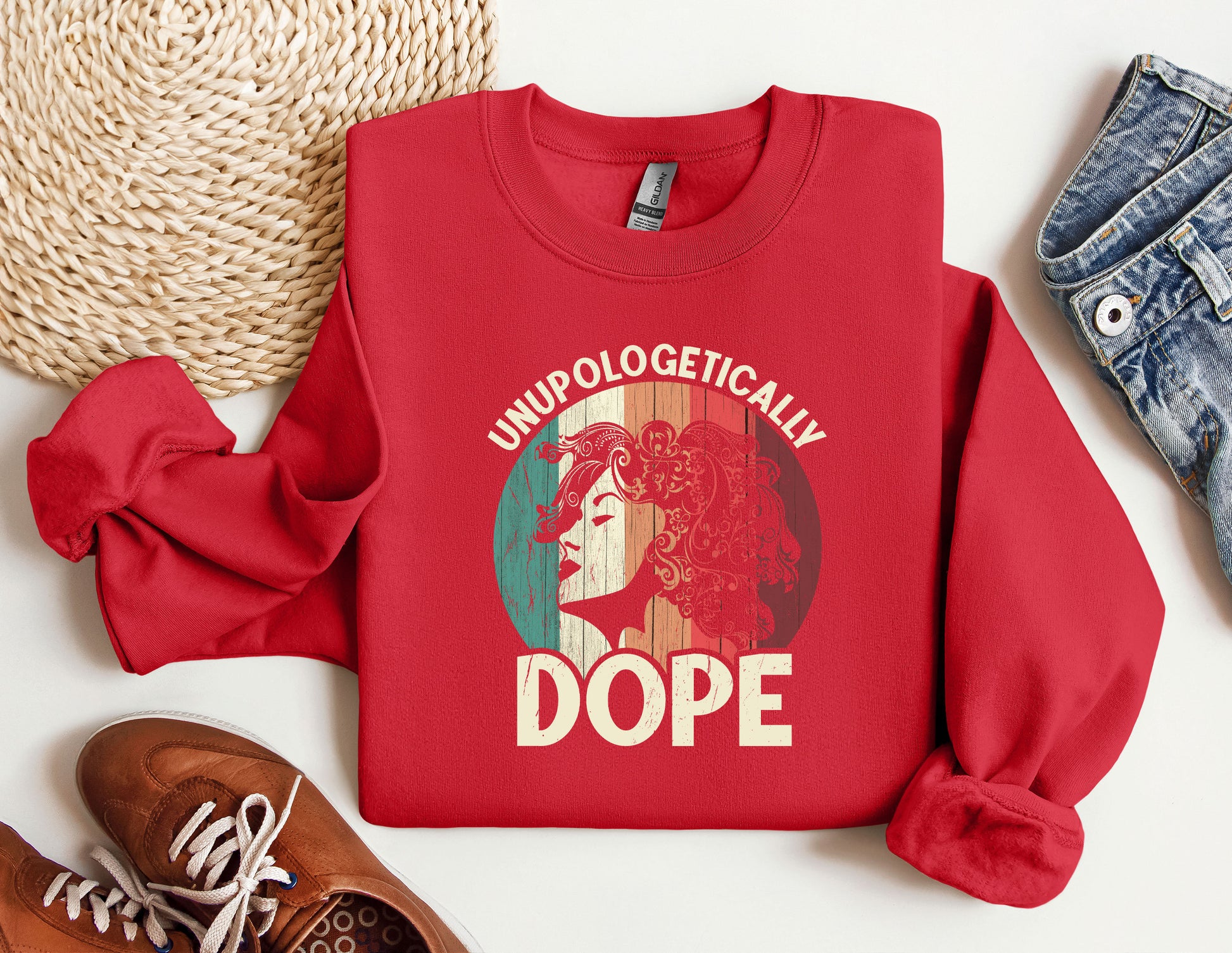 a red sweatshirt with a picture of a woman&#39;s face on it