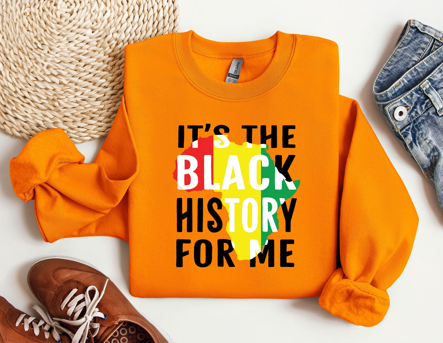 an orange sweatshirt with the words it&#39;s the black history for me on it