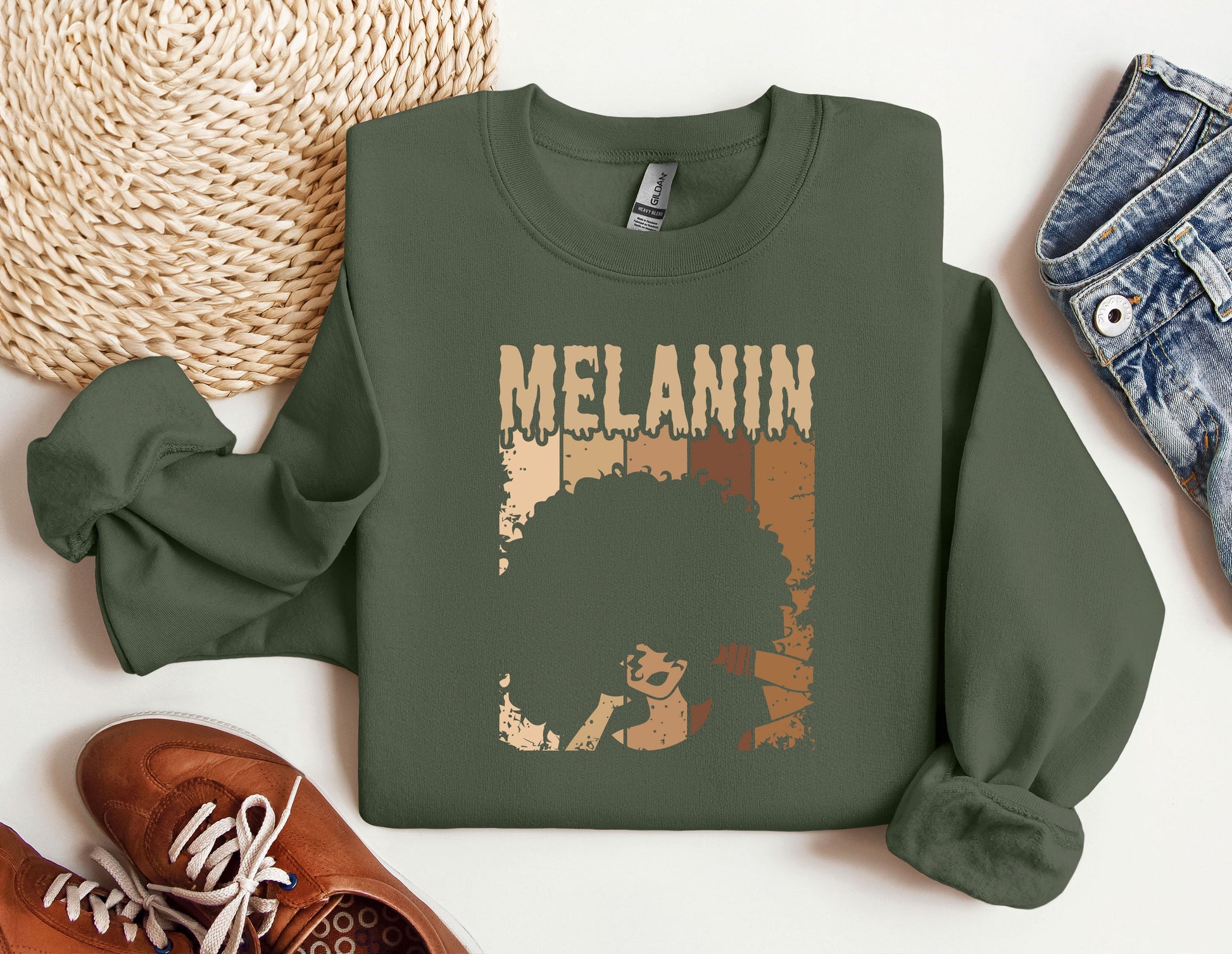 a green sweatshirt with a picture of a woman&#39;s hair