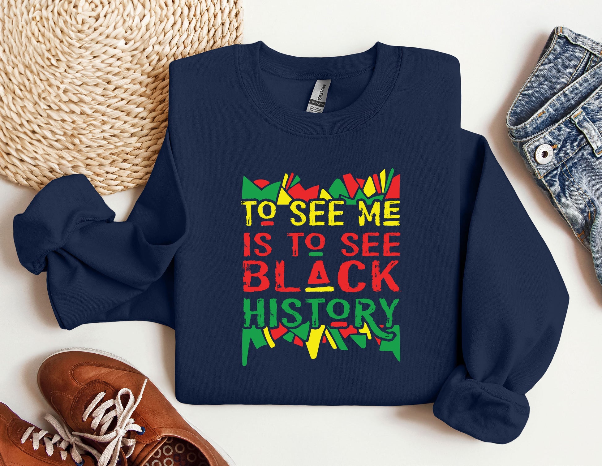 a blue sweatshirt with the words to see me is to see black history