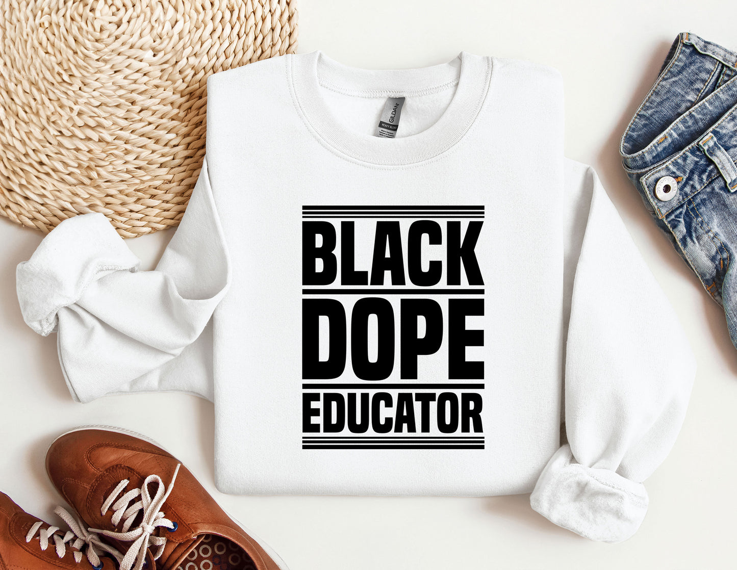 a white sweatshirt with black dope educator on it