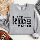 a sweatshirt that says black kids matter on it