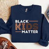 a blue sweatshirt with the words black kids matter on it