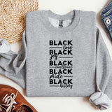 a gray sweatshirt with black lettering on it