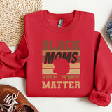 a red sweatshirt with the words black moms with white matter on it