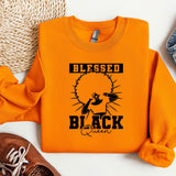 an orange shirt with a black woman on it