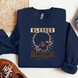 a blue sweatshirt with a black queen on it