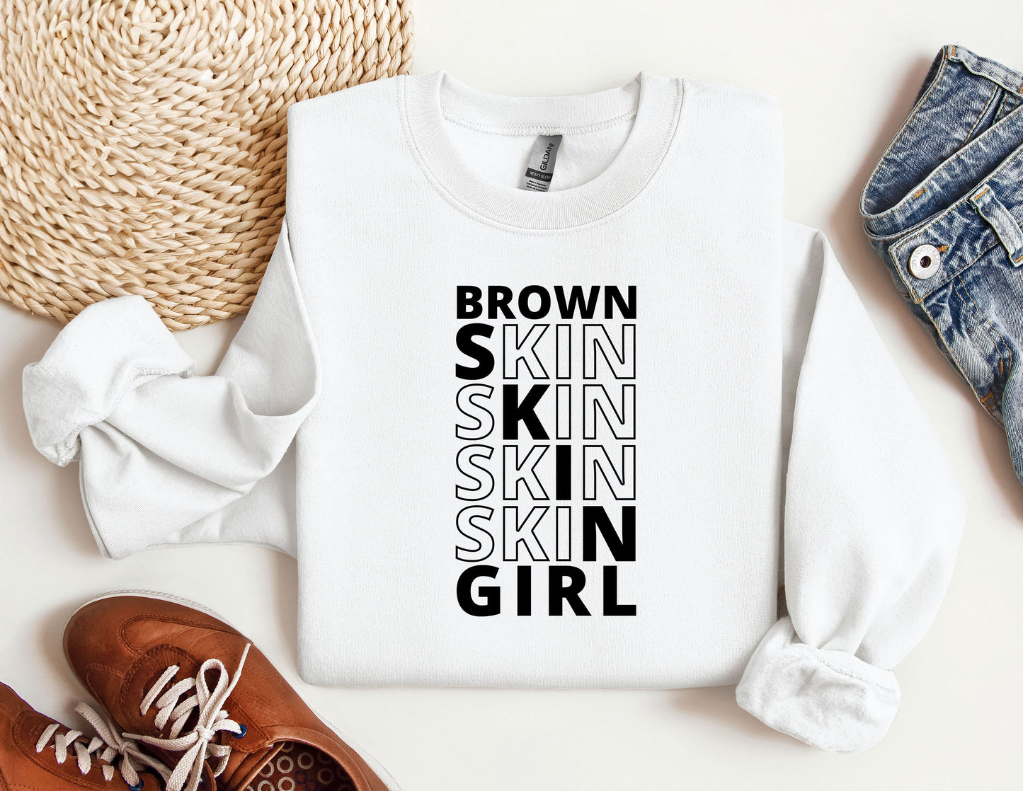 a white shirt with the words brown skin skin skin skin girl on it