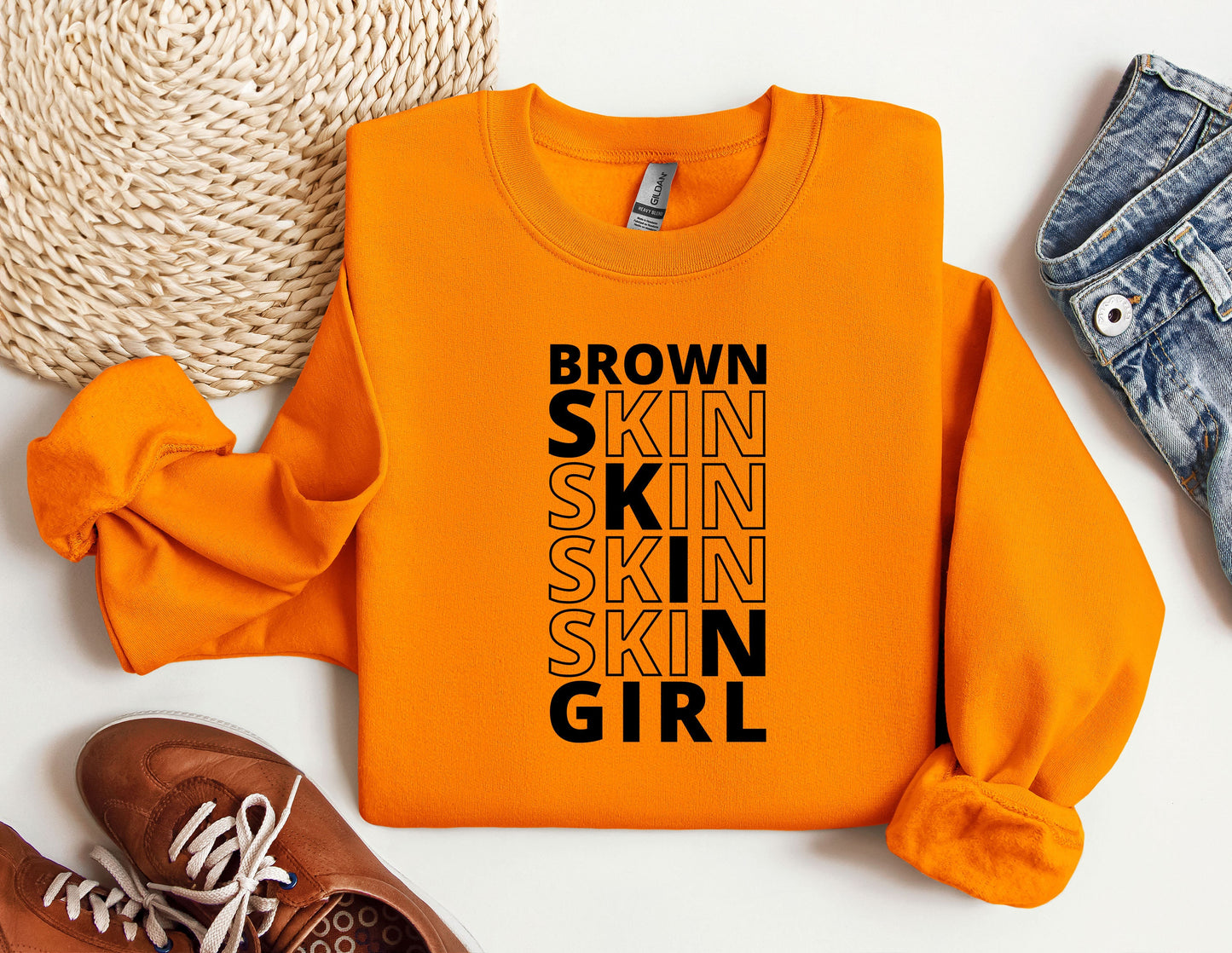 an orange shirt with the words brown skin skin skin skin girl on it