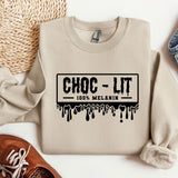 a pair of shoes, a sweater, and a pair of jeans on a white