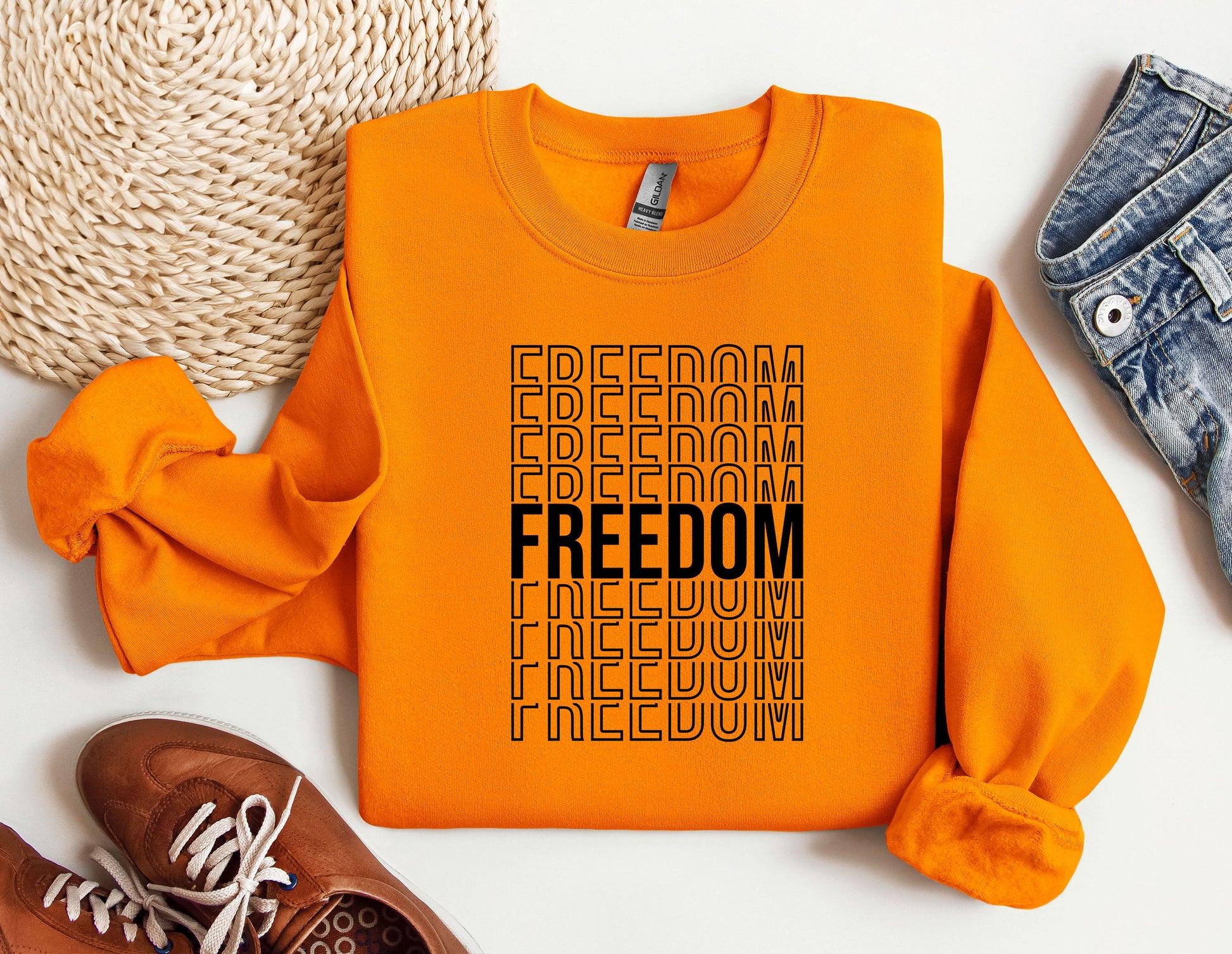 an orange shirt with the words freedom on it