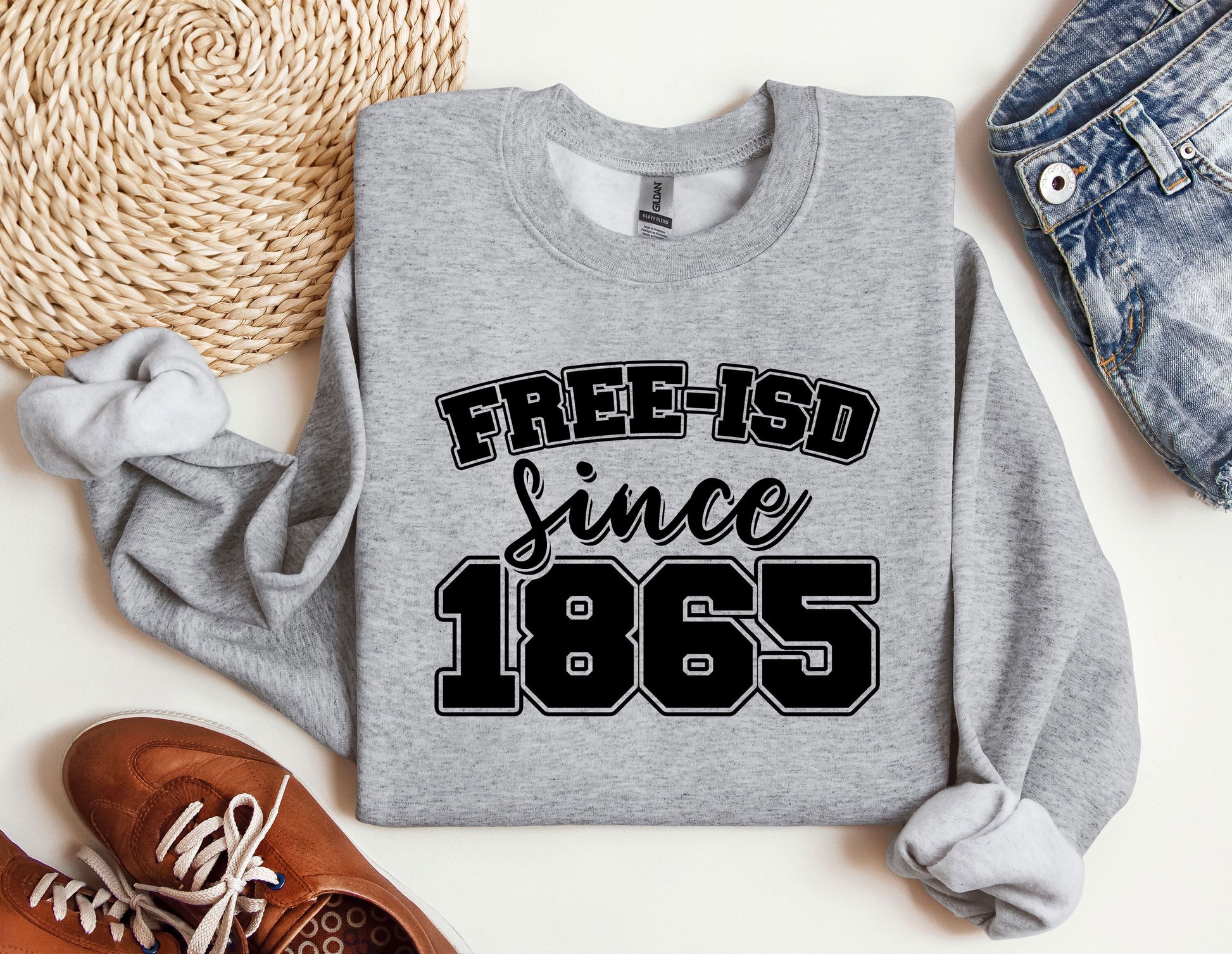 a sweater that says free is since 1965