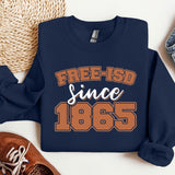a sweatshirt that says free - isd since 1965 next to a pair of shoes