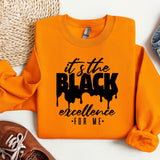 an orange sweatshirt with the words it's the black excellence on it