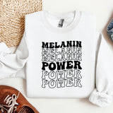 a white sweatshirt with the words melanin, melanin, melani