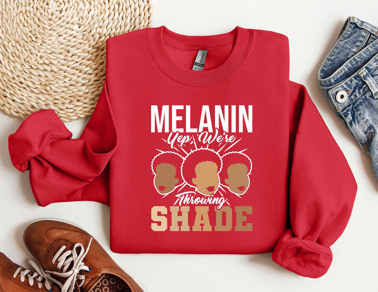 a red sweatshirt with the words melanin on it