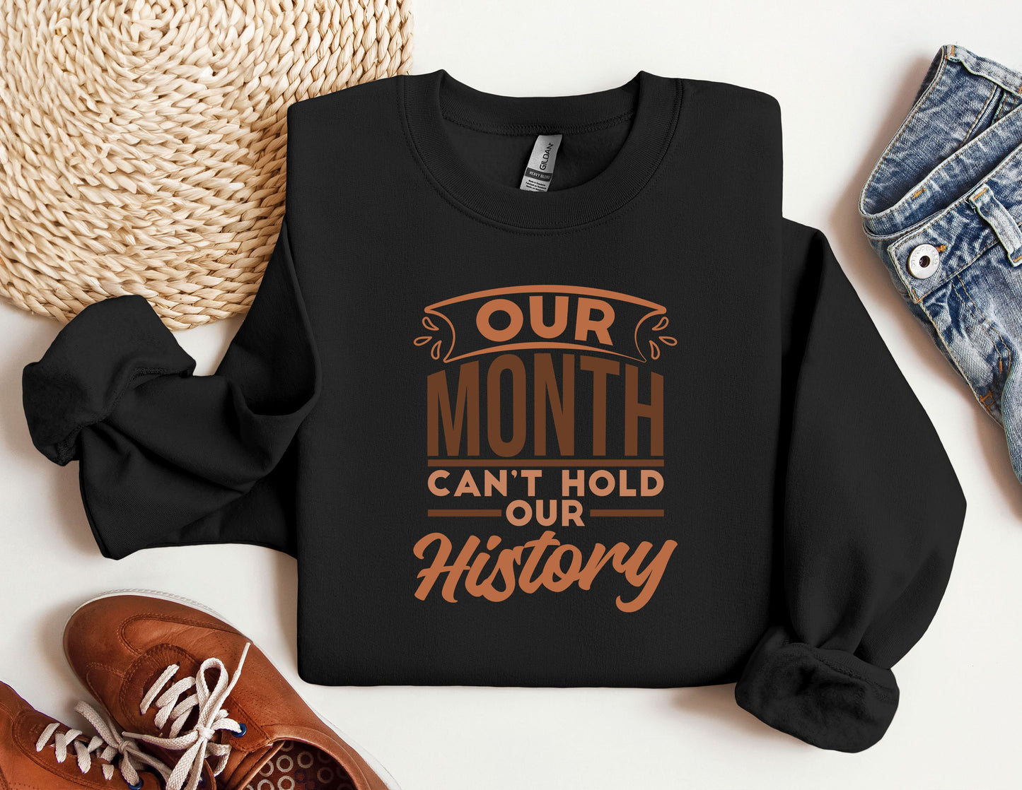 a black sweatshirt with the words our month can&#39;t hold our history