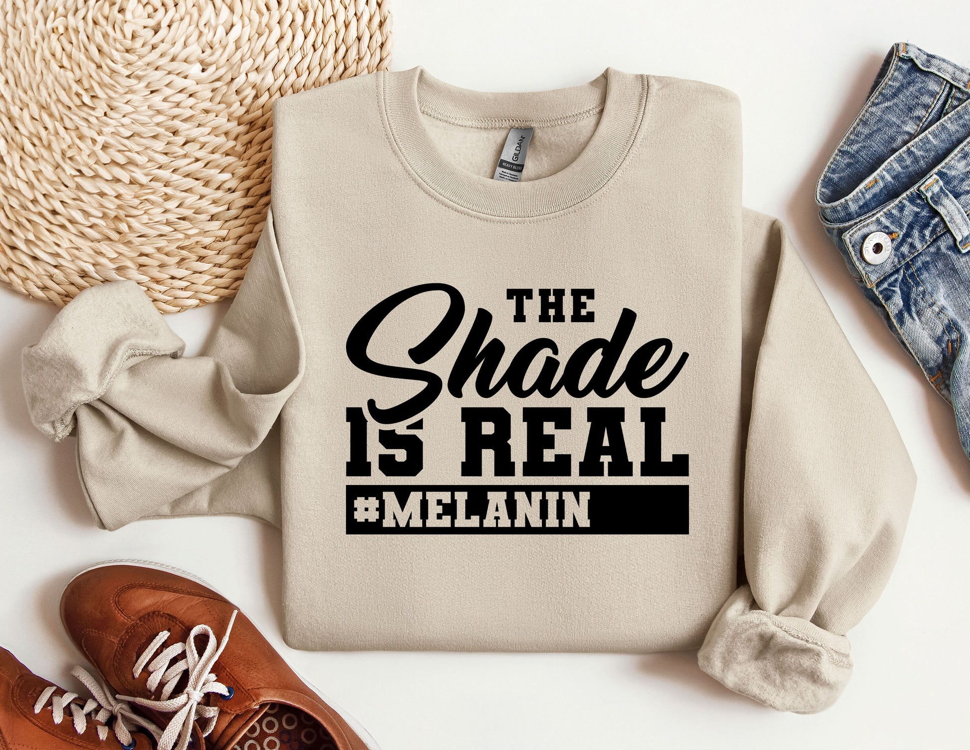 a sweatshirt that says the shade is real and melanin