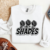 a white sweatshirt with the words shades printed on it