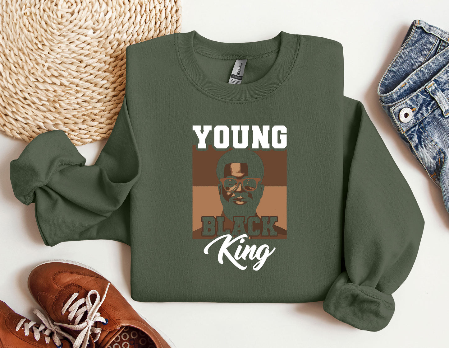 a green sweatshirt with a picture of a black king on it