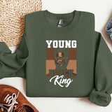 a green sweatshirt with a picture of a black king on it