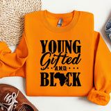 an orange shirt that says young, gifted and black