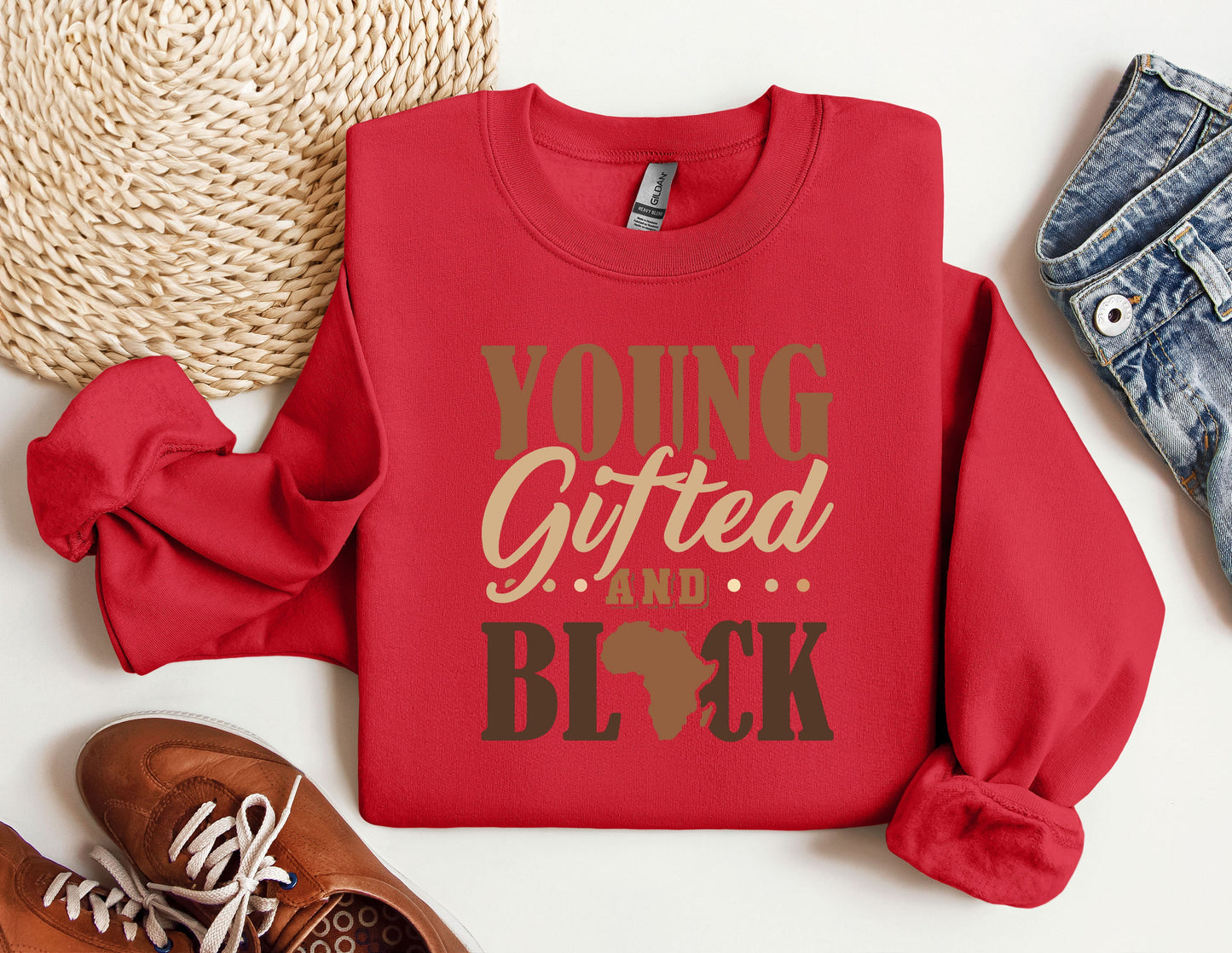 a red shirt with the words young, gifted and black on it