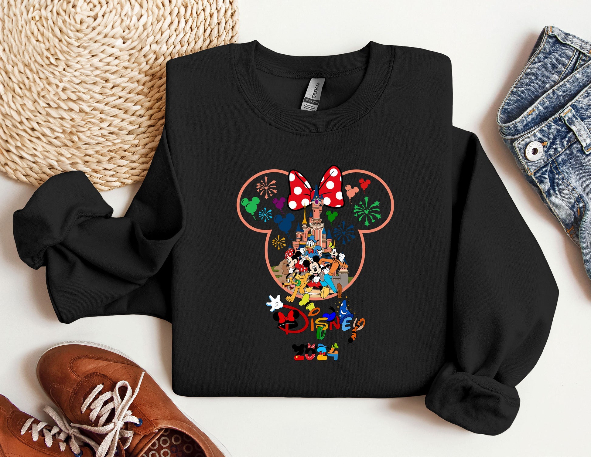 a mickey mouse shirt with mickey mouse heads on it