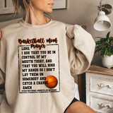 a woman wearing a sweatshirt with a basketball on it
