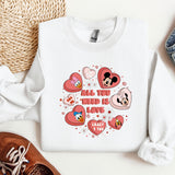 a white shirt with hearts and mickey mouses on it