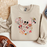 a sweater with a mickey mouse design on it