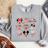 a sweater with mickey mouse and other disney characters on it