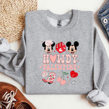 a sweatshirt with mickey and minnie mouses on it