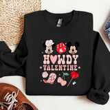 a black sweatshirt with minnie mouse and mickey mouse on it