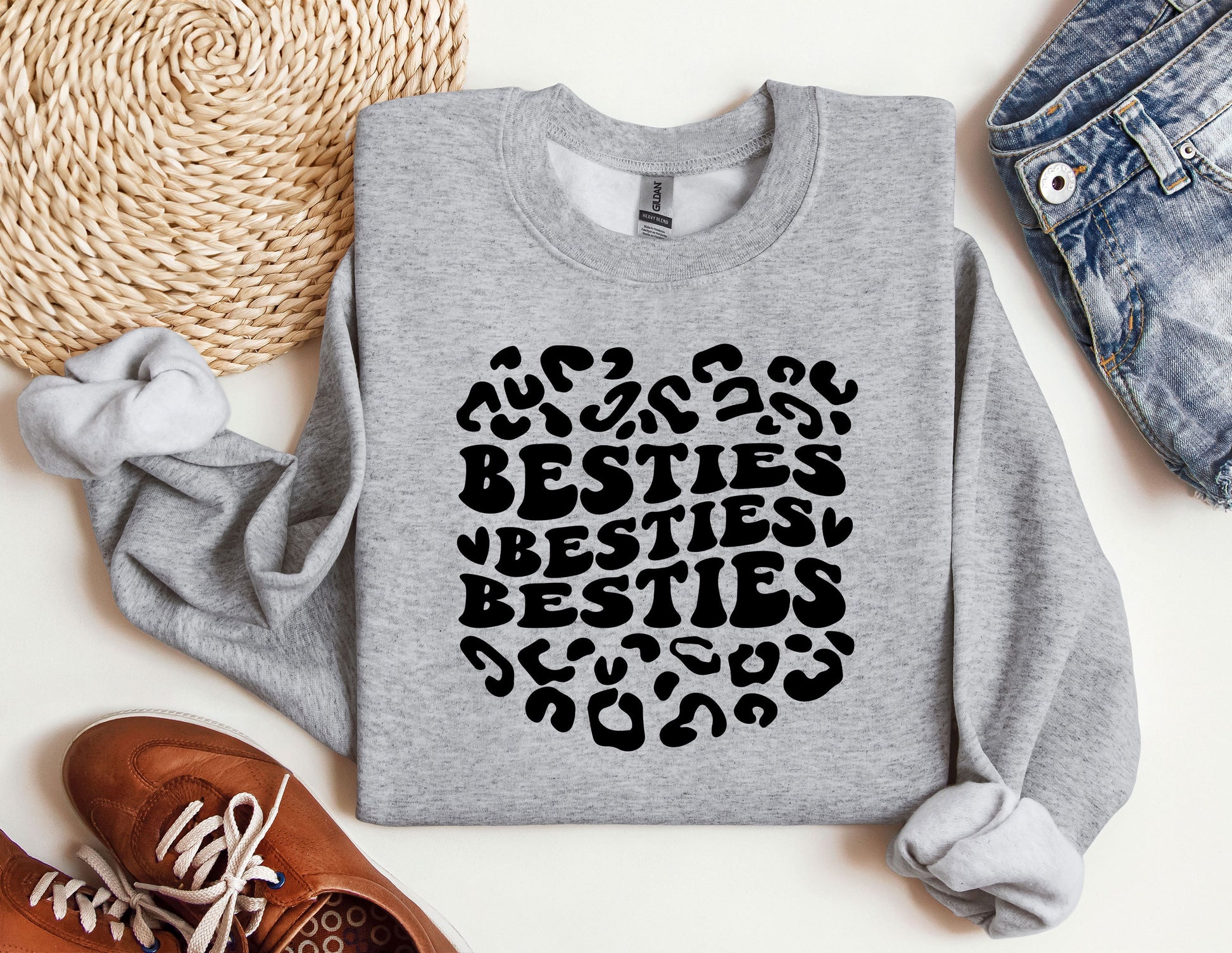 a sweatshirt with the words besties written on it