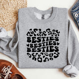 a sweatshirt with the words besties written on it