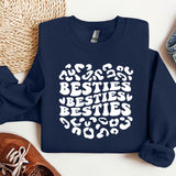 a blue sweatshirt with the words besties besties on it