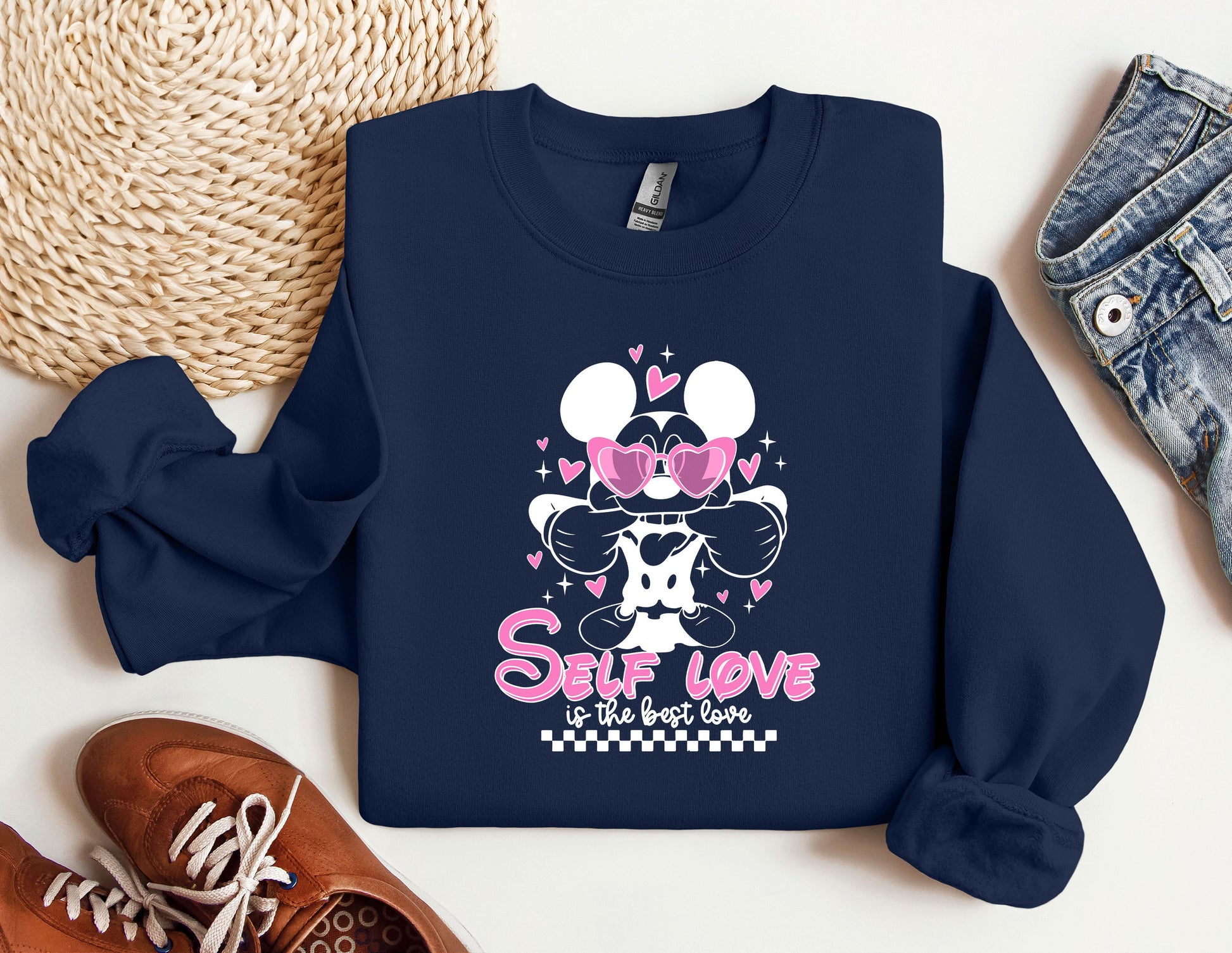 a blue sweatshirt with minnie mouse on it