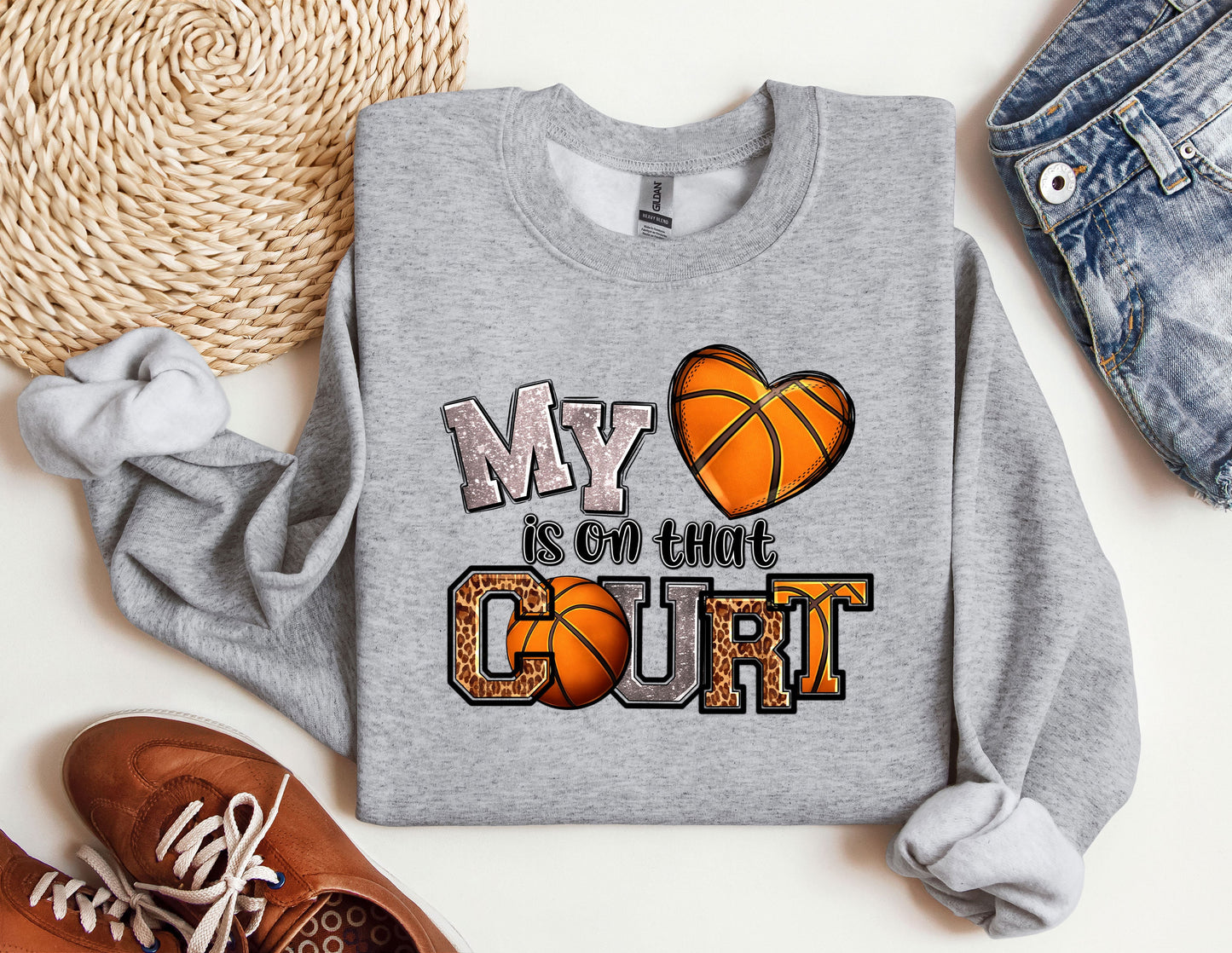 a sweatshirt that says my heart is on the court