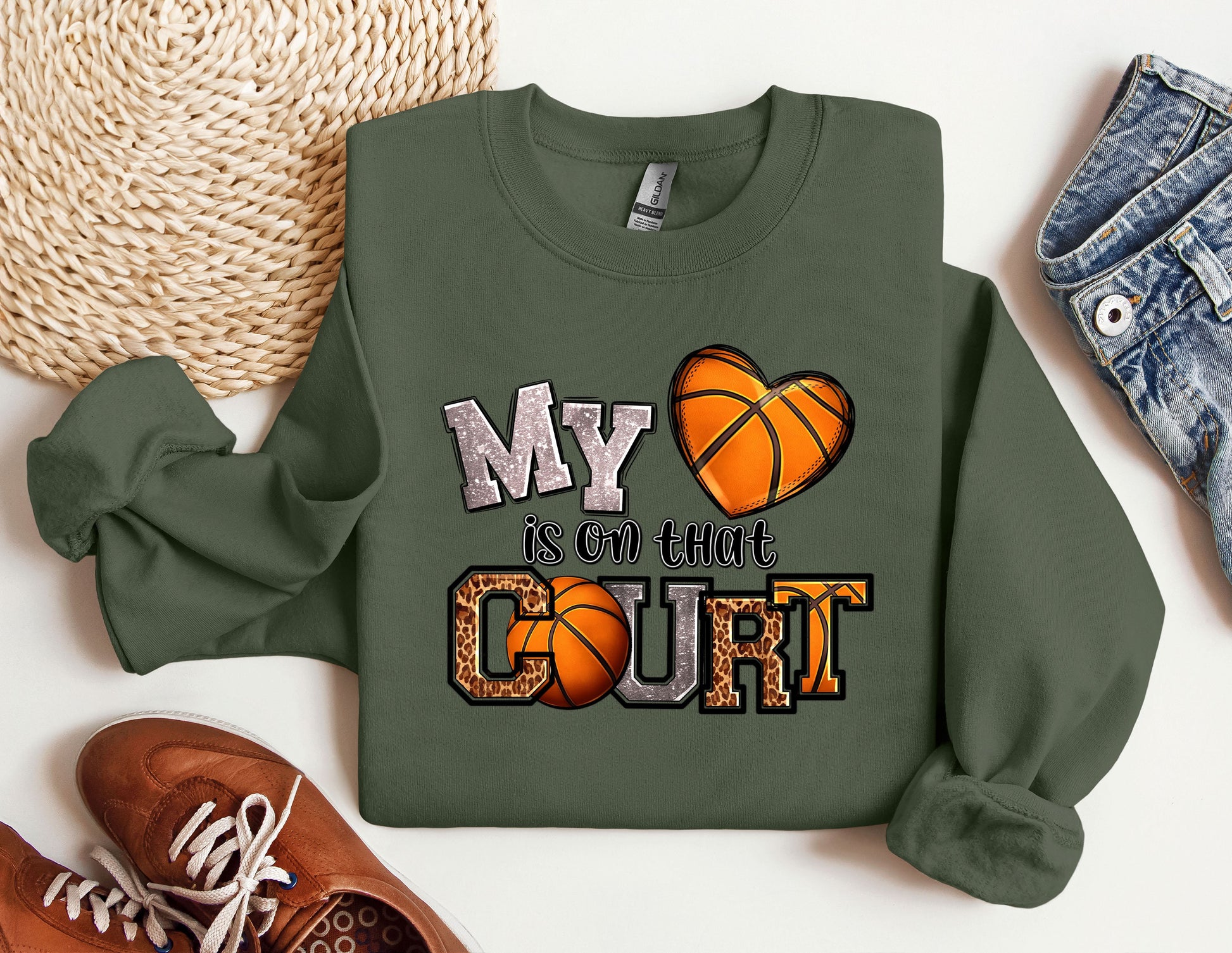 a sweatshirt with a basketball and a pair of sneakers