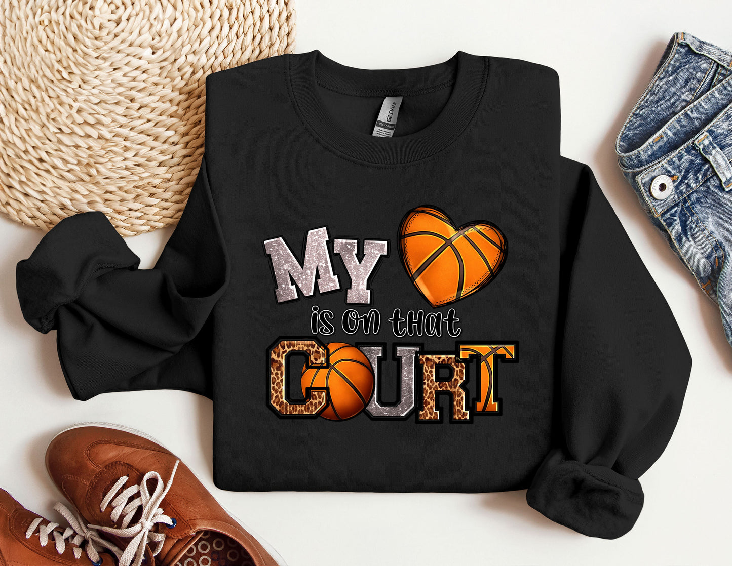 a black sweatshirt with a basketball on it