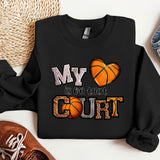 a black sweatshirt with a basketball on it