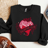 a black shirt with a pink heart on it