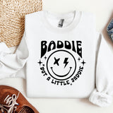 a white sweatshirt with a smiley face on it