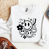 a white shirt with a smiley face on it